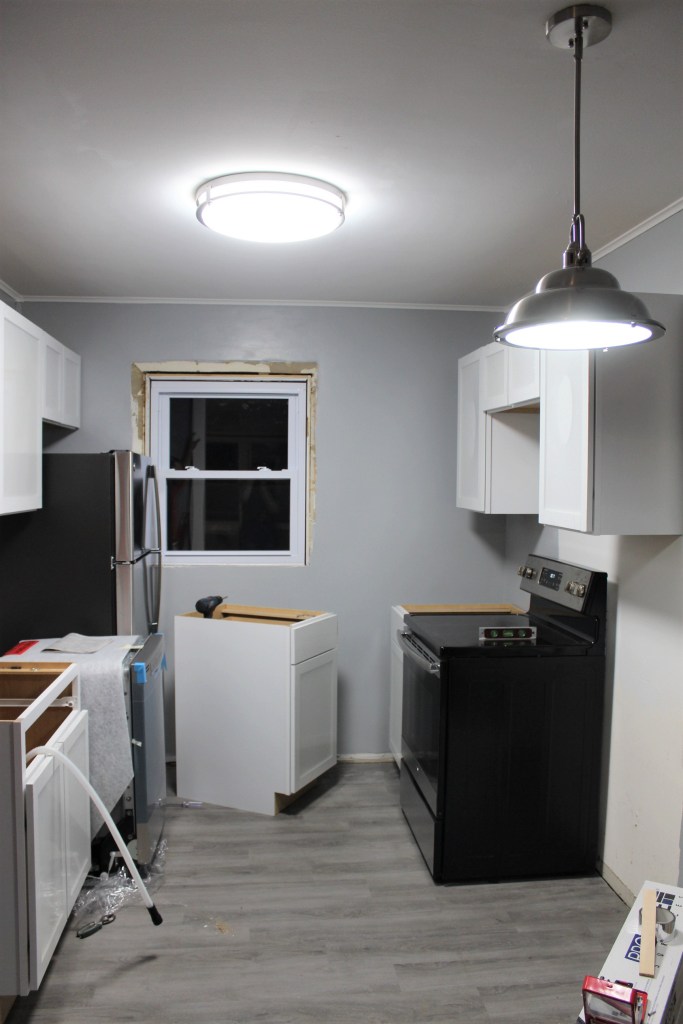 Upper cabinets installed!!  (the hard part is over!!)